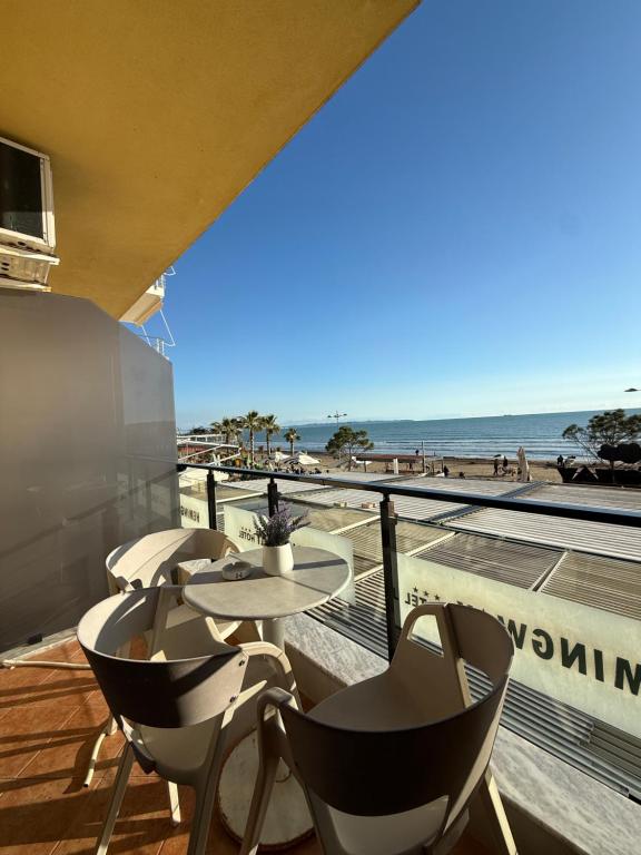 Balcony view with the Hotel Heming-uej signage in the foreground
