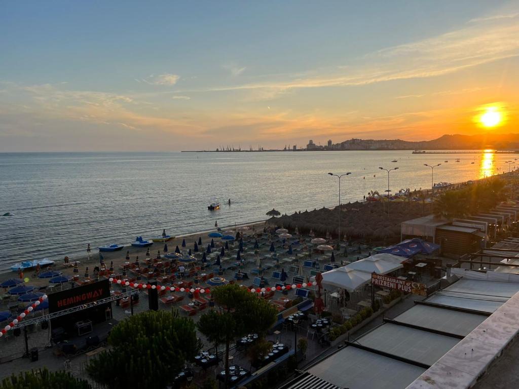 Aerial view of the Heming-uej beach club at sunset on the Durrës coastline