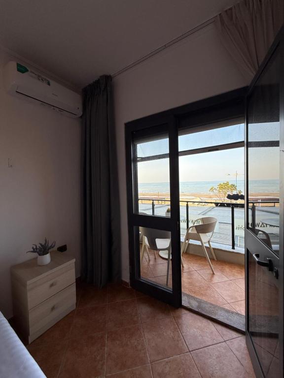 Bedroom doorway opening onto the sea-view balcony