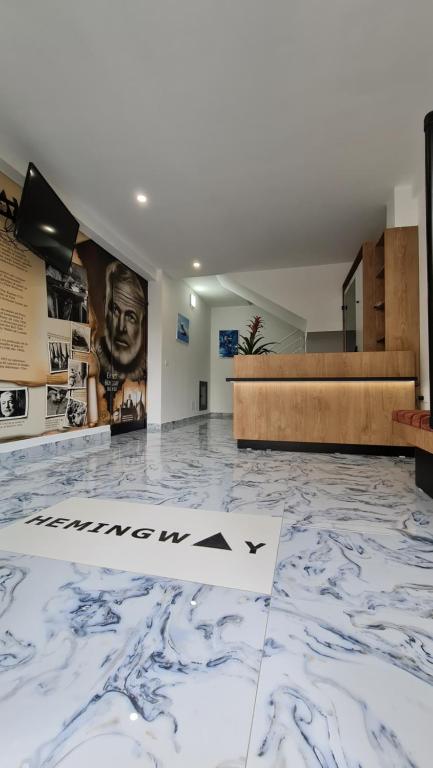 Hotel lobby with large Hemingway portrait mural